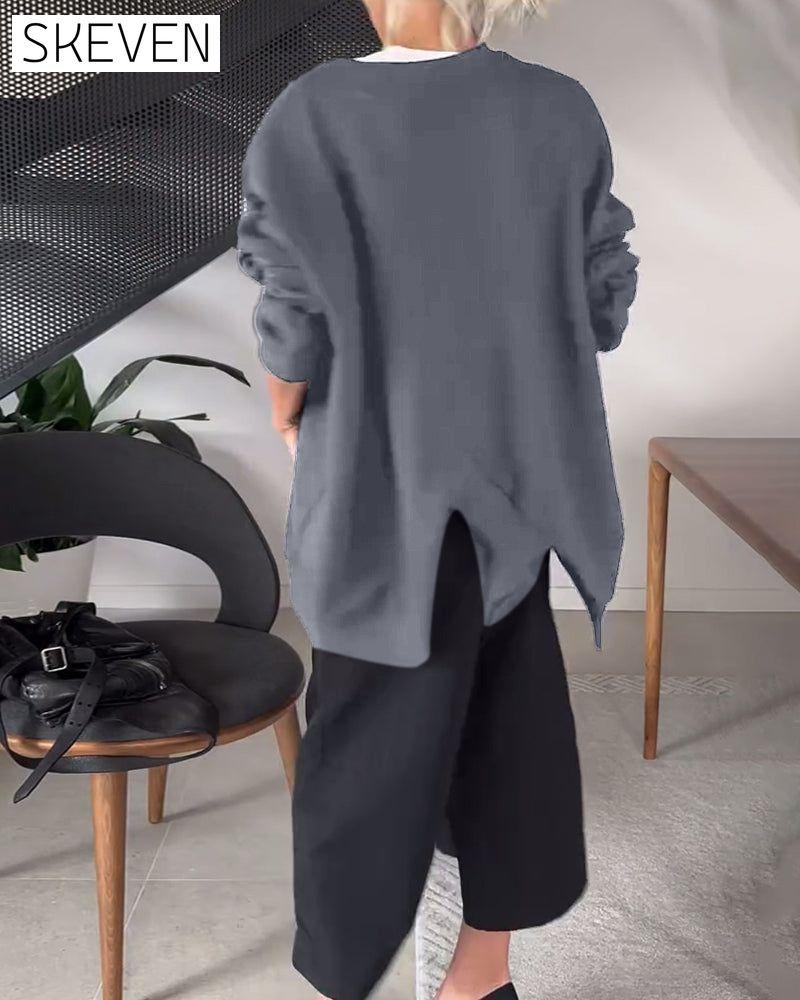 Lässiges Sweatshirt mit Rundhalsausschnitt und Schlitz in Unifarbe