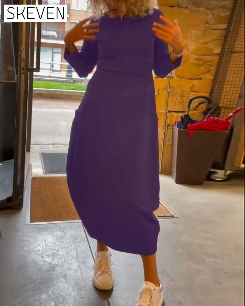 Solid color round neck long sleeve pocket dress
