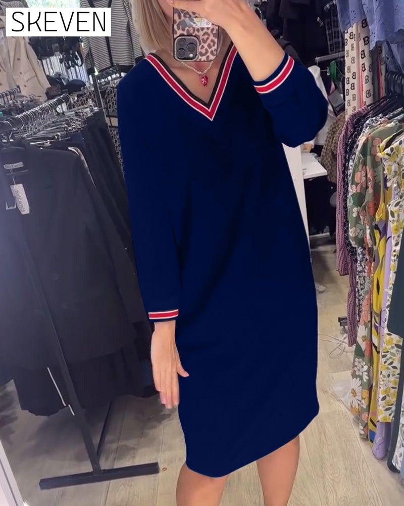 Robe élégante à col en V avec poches