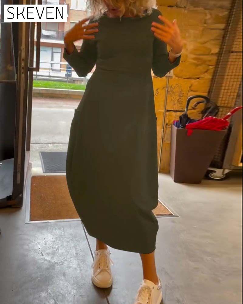 Solid color round neck long sleeve pocket dress