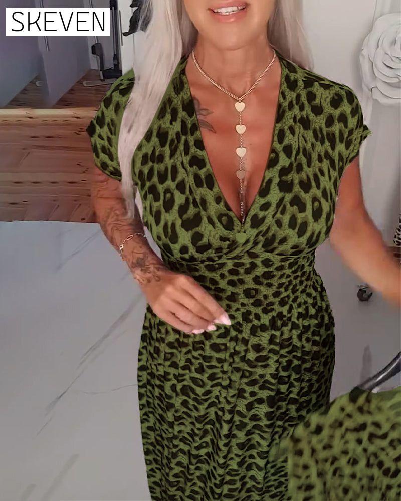 Elegantes Kleid mit Leopardenmuster und V-Ausschnitt