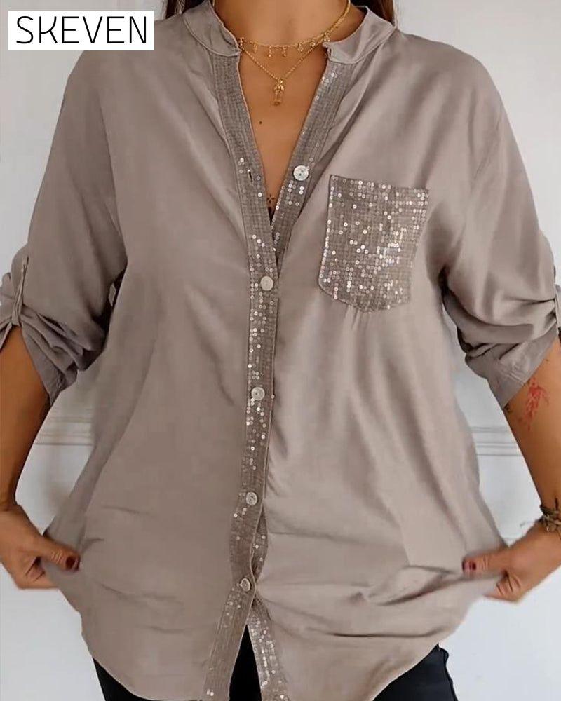 Paneled sequin button casual top