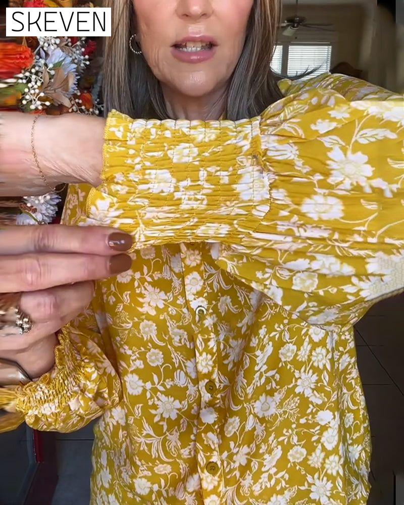 Bluse im Retro-Stil mit Knöpfen und Blumenmuster