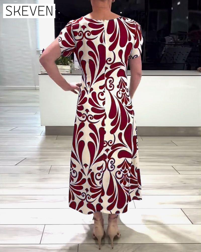 Elegantes Kurzarmkleid mit Kontrastprint