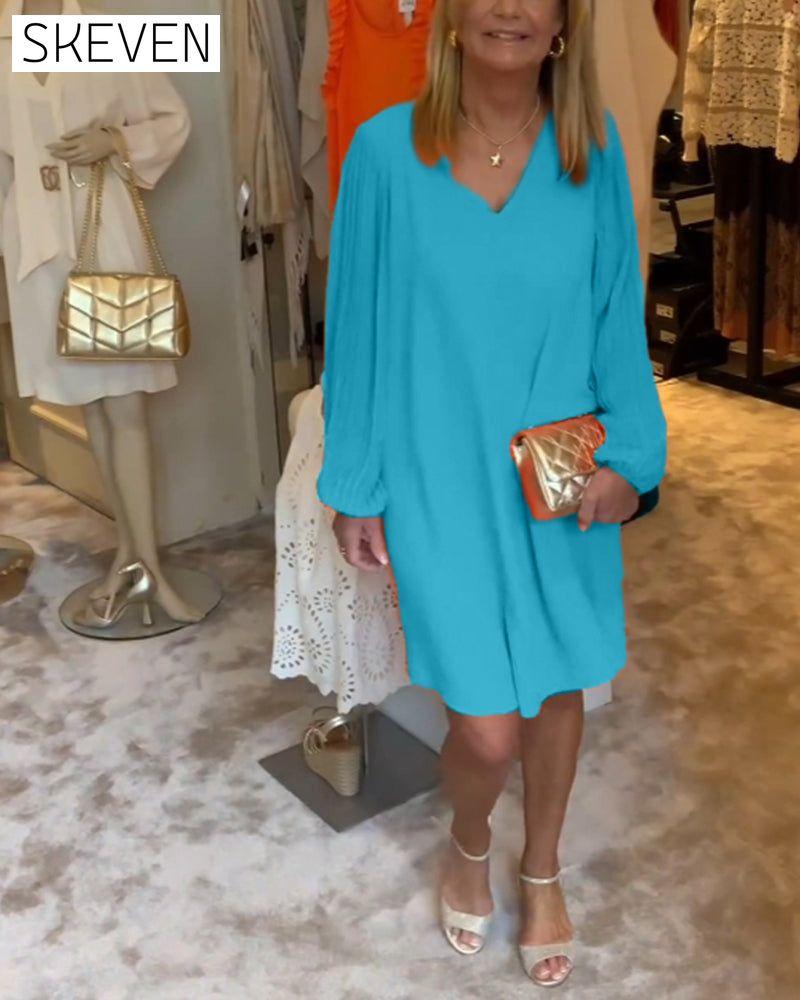 einfarbiges Kleid mit Laternenärmeln und V-Ausschnitt