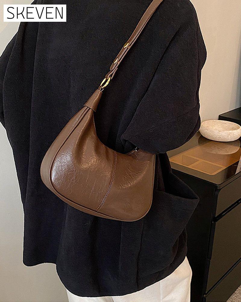 Achseltasche aus gewachstem Leder 