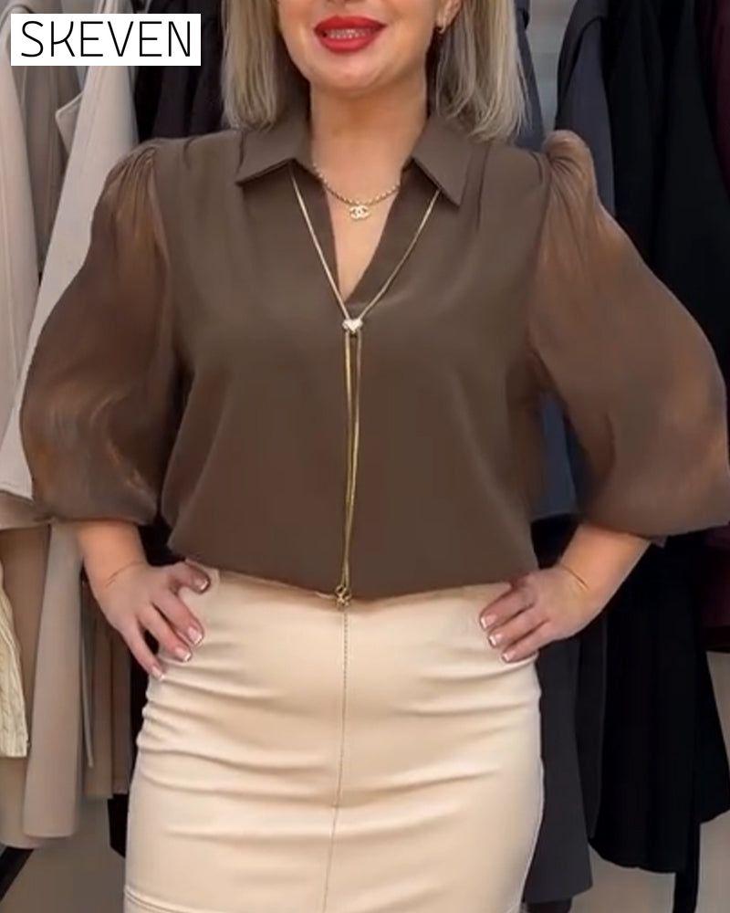 Elegante, transparente Bluse mit Kragen und Puffärmeln