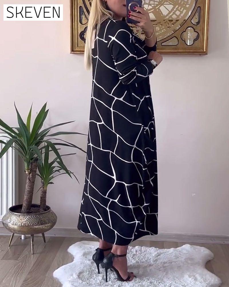 Robe ample à manches longues et col rond avec poches