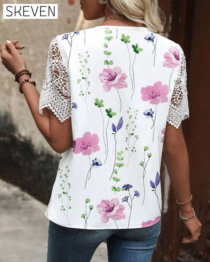 Bedruckte Bluse mit Spitzenbesatz