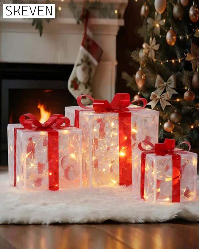 Weihnachtsdekorationen in Form von leuchtenden Geschenkboxen