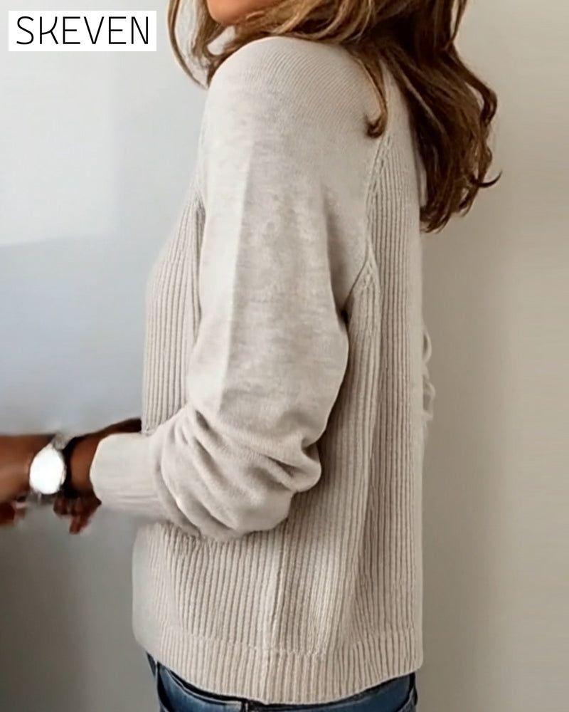 Stilvoller Pullover mit Raglanärmeln und Knopfleiste
