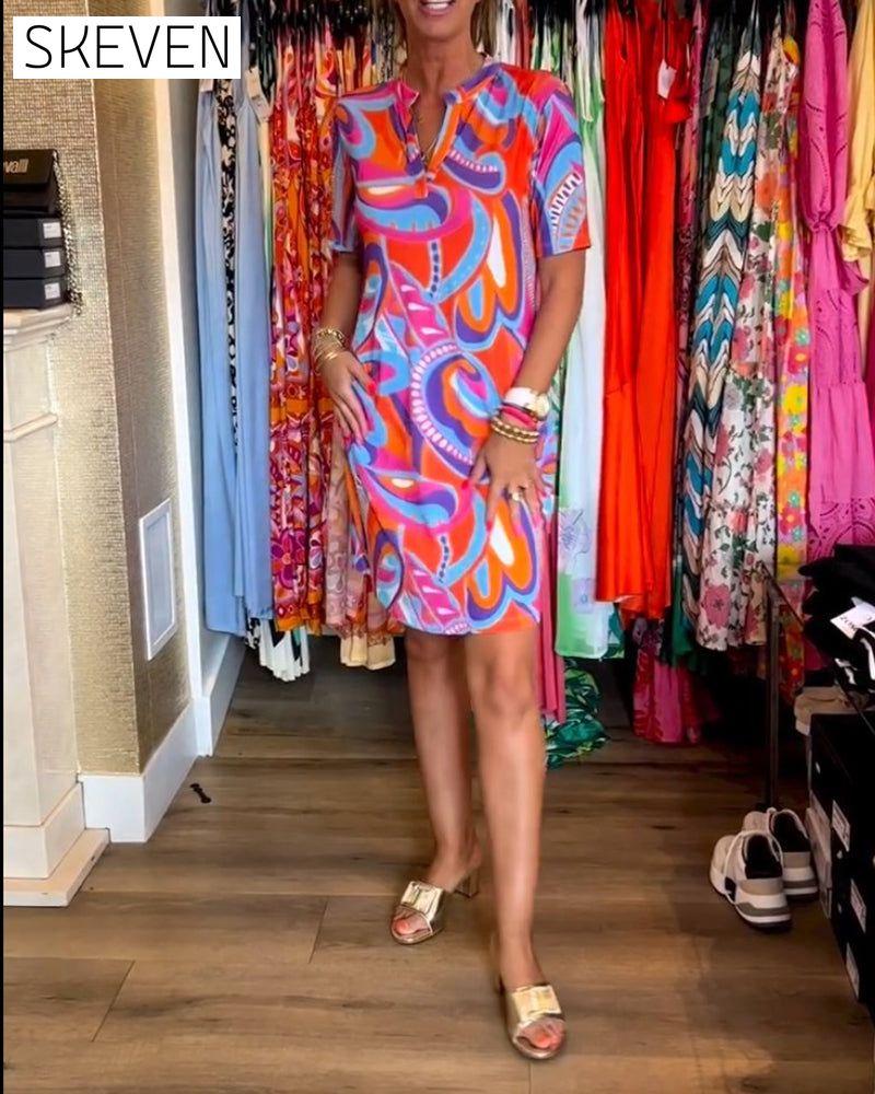 Robe à poches imprimées colorées et col en V