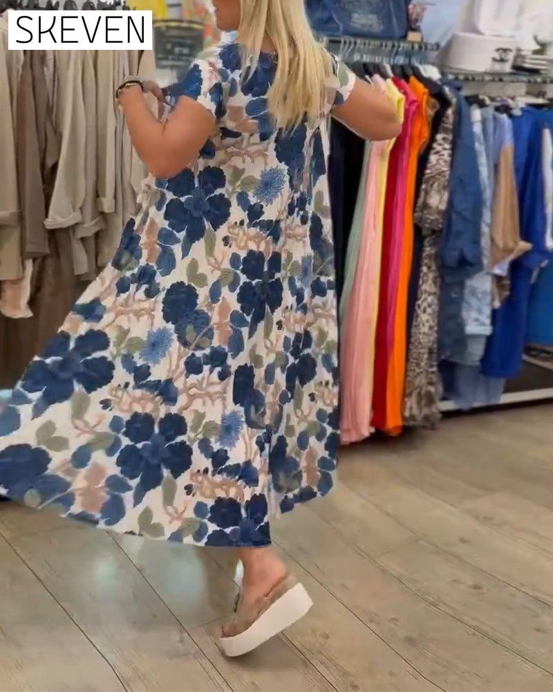 Elegantes Kleid mit Rundhalsausschnitt und Blumenmuster