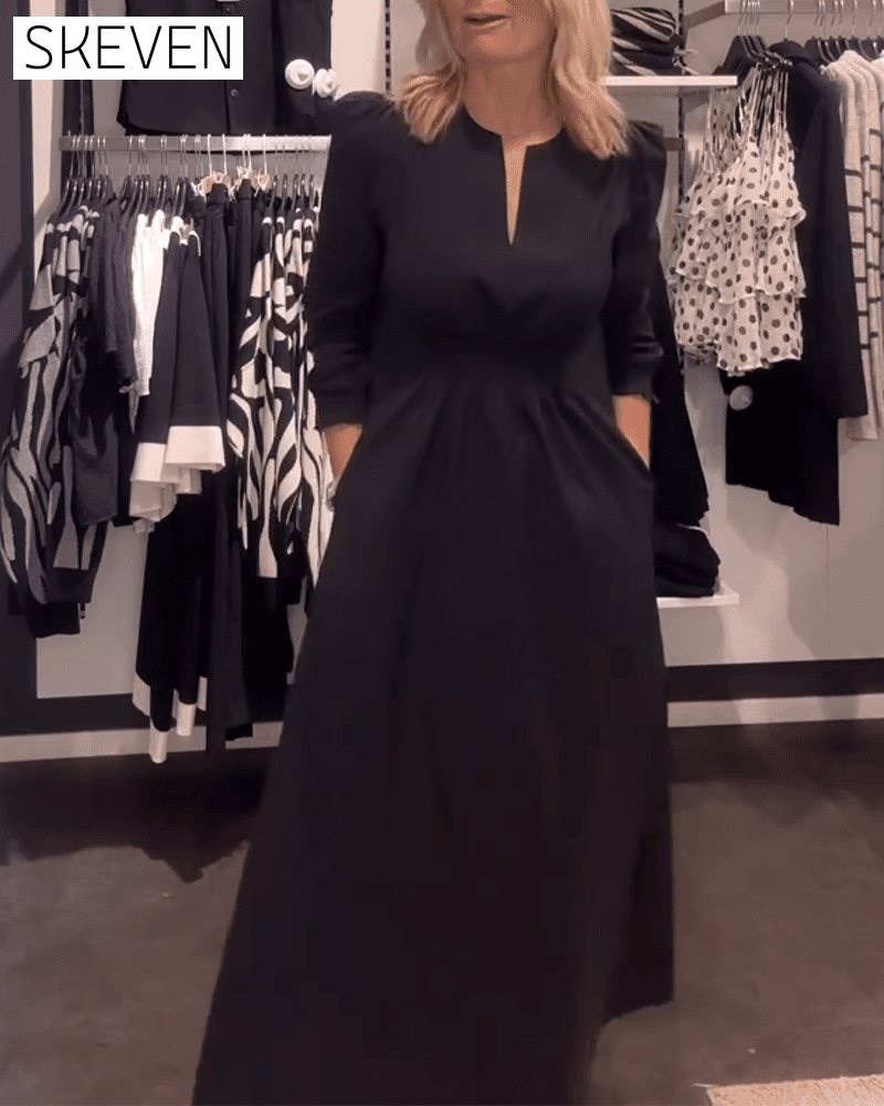 Robe trapèze à manches bouffantes et taille haute