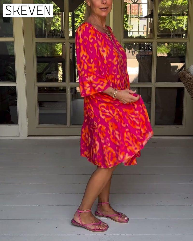 locker sitzendes, bedrucktes Kleid mit Glockenärmeln