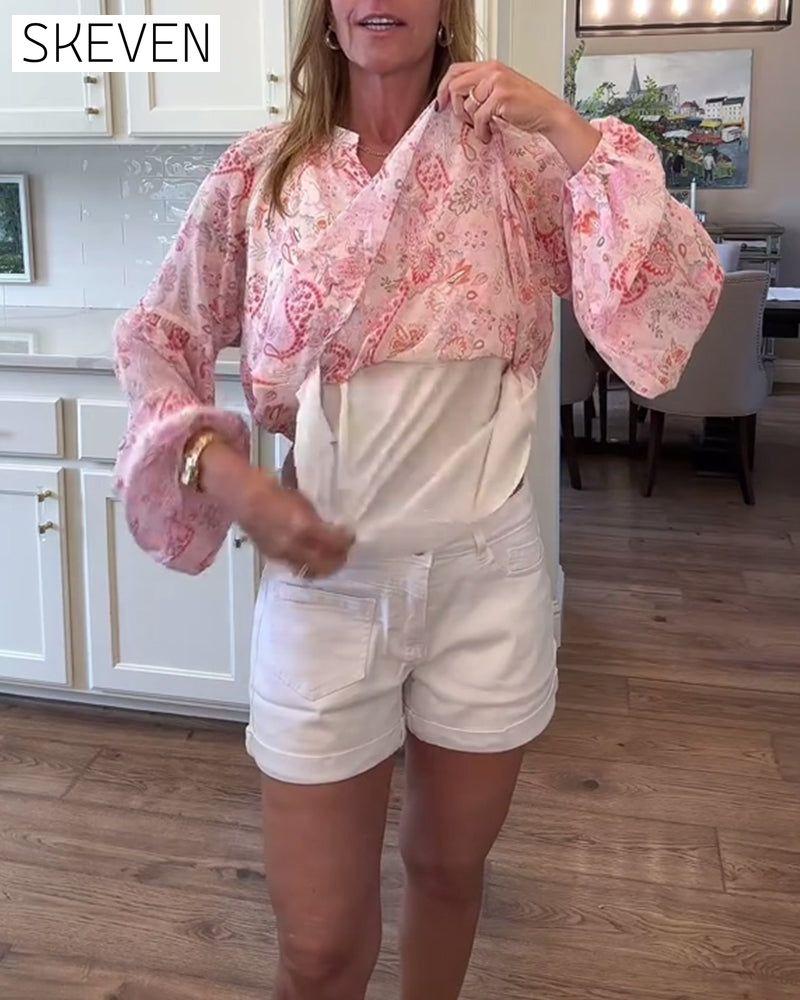 Blouse fleurie à manches ballon
