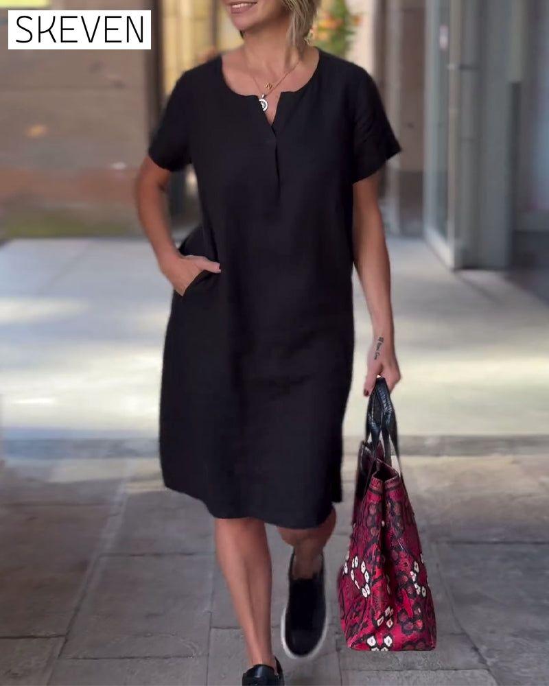 Einfarbiges Kurzarmkleid mit V-Ausschnitt und Taschen