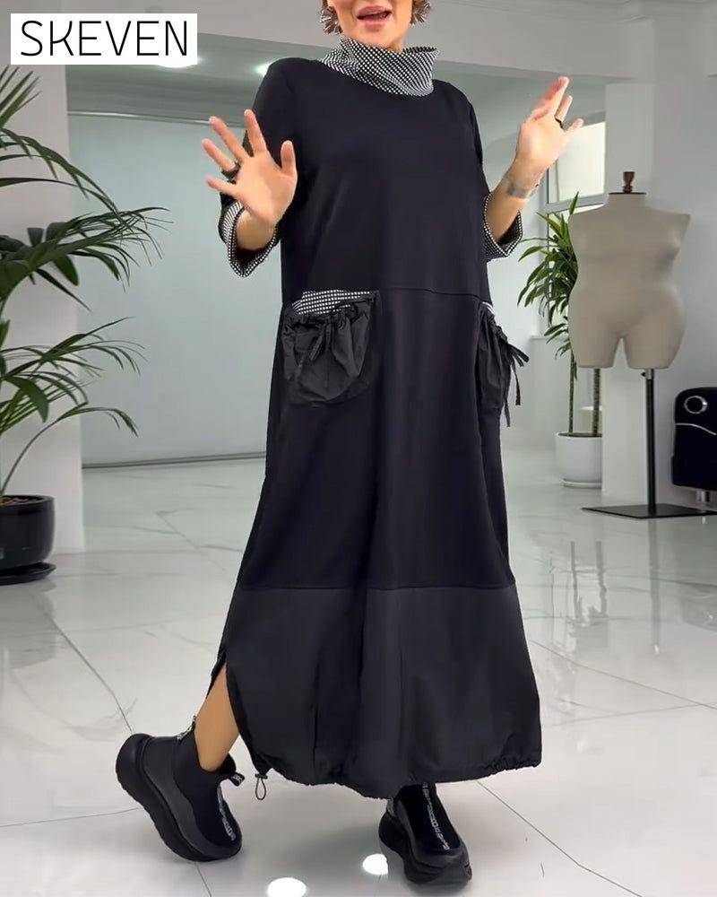 Lässiges Kleid mit Karomuster, hohem Kragen und Taschen