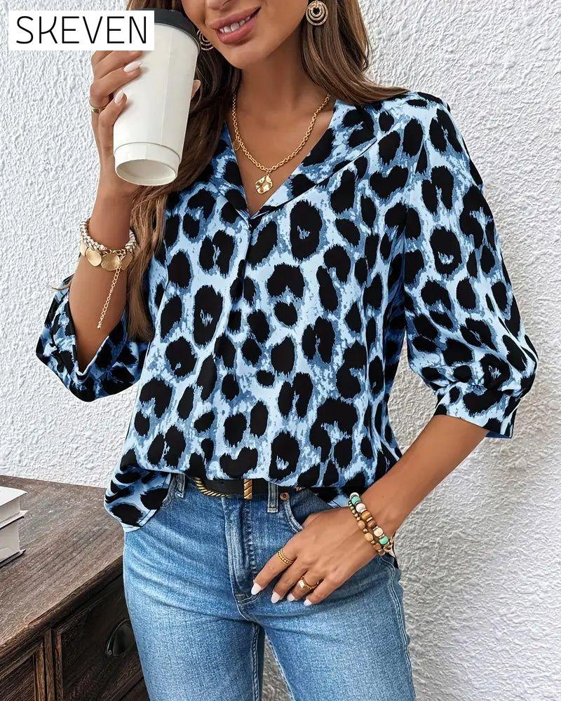 Halbärmelige, lockere Bluse mit Leopardenmuster