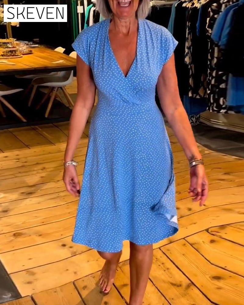 robe à pois à manches courtes et col en V