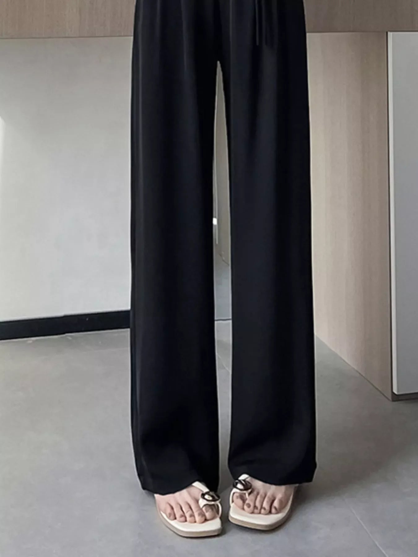 Hochgeschnittene, weite Hose