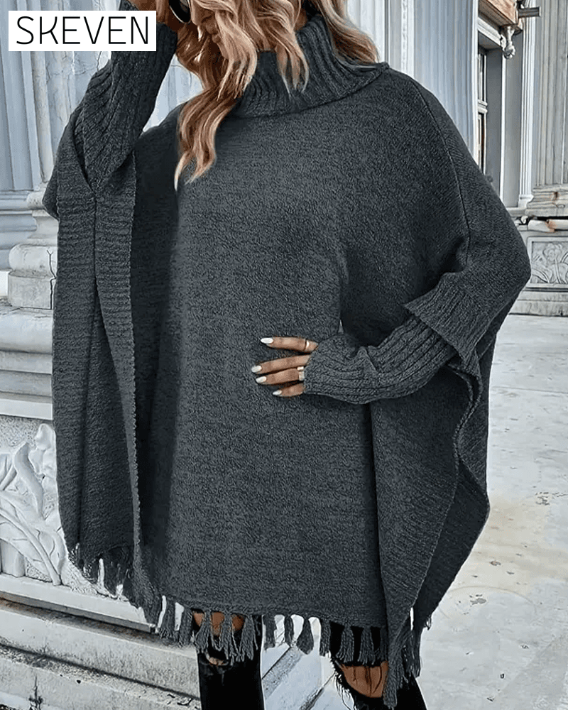 Rollkragenpullover mit Fledermausärmeln und Quasten