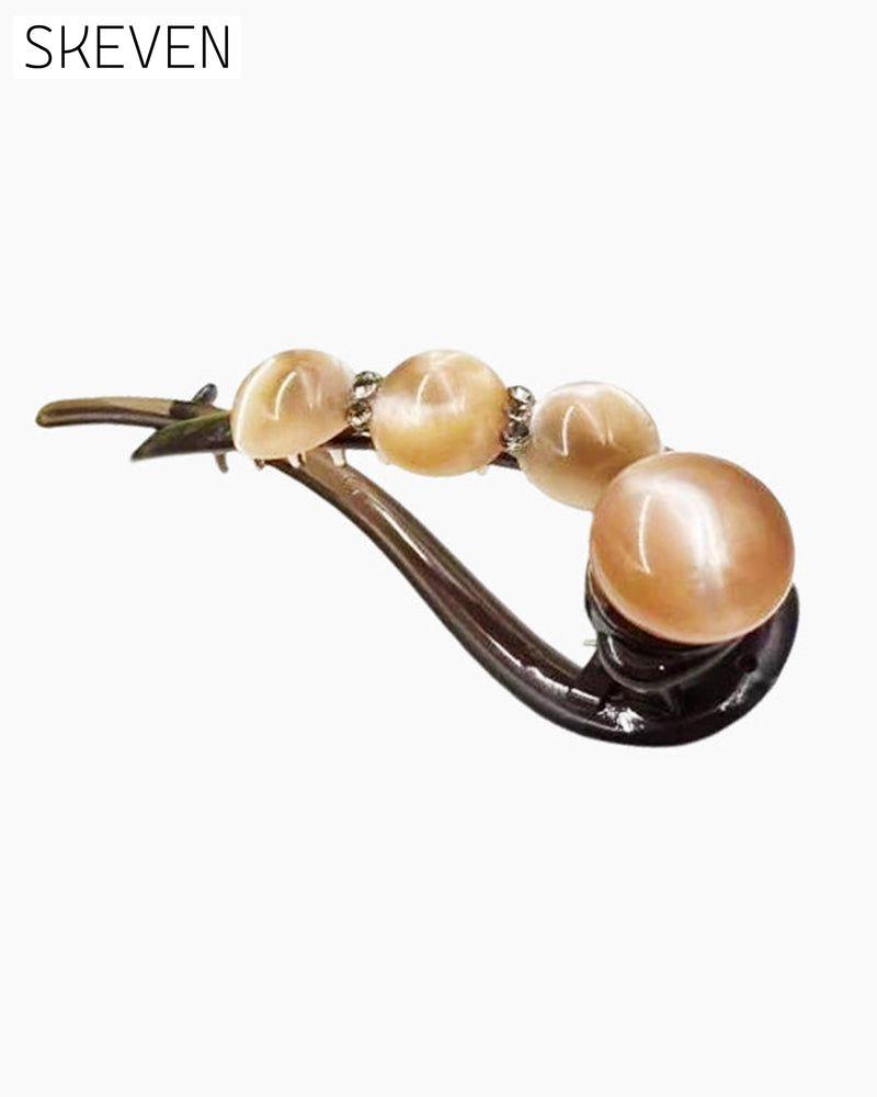 Elegante Haarspange für nach hinten gekämmte Frisuren