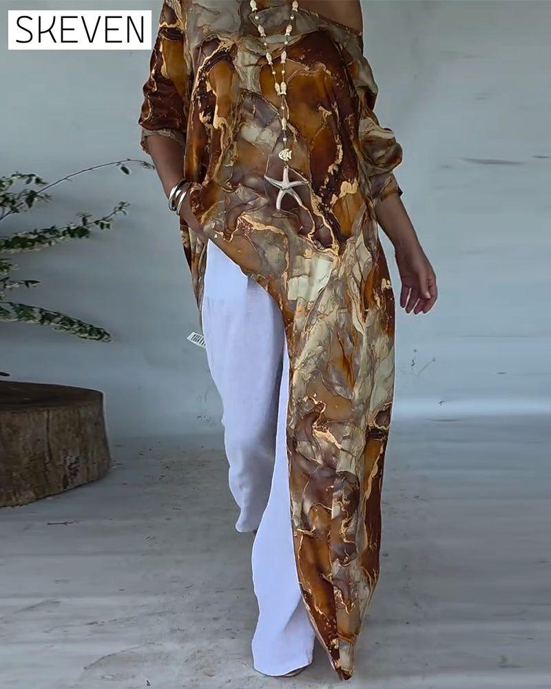 Modische Bluse mit Schlitz und Print