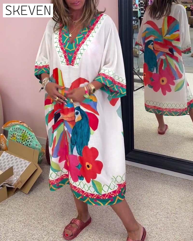 Kleid mit Graffiti-Print und V-Ausschnitt