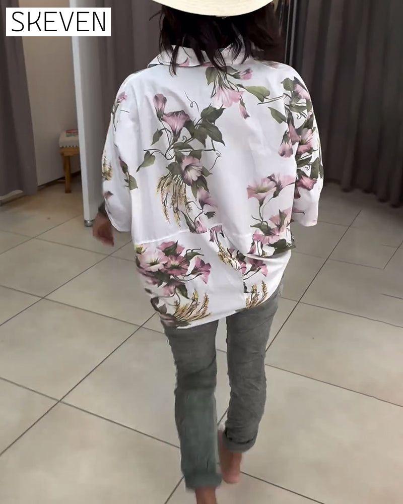 Elegante Bluse mit Revers und Blumenmuster