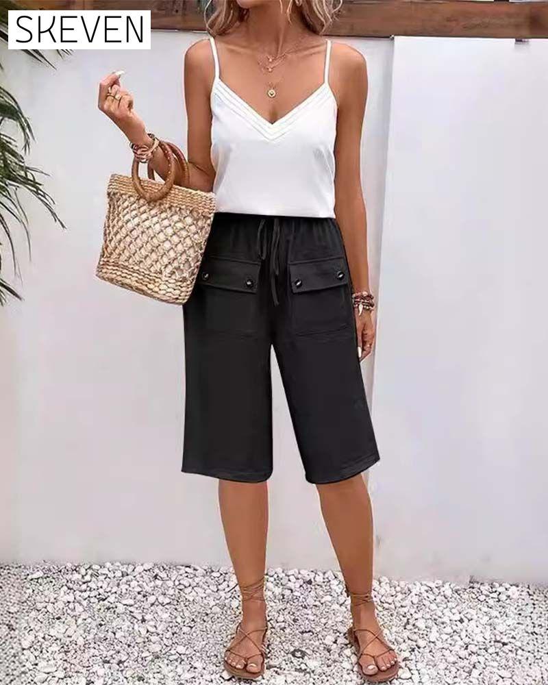 Casual solid color pocket half length trousers