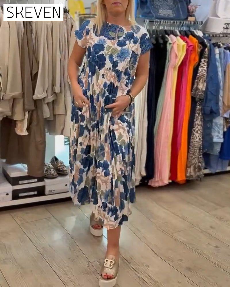 Elegantes Kleid mit Rundhalsausschnitt und Blumenmuster