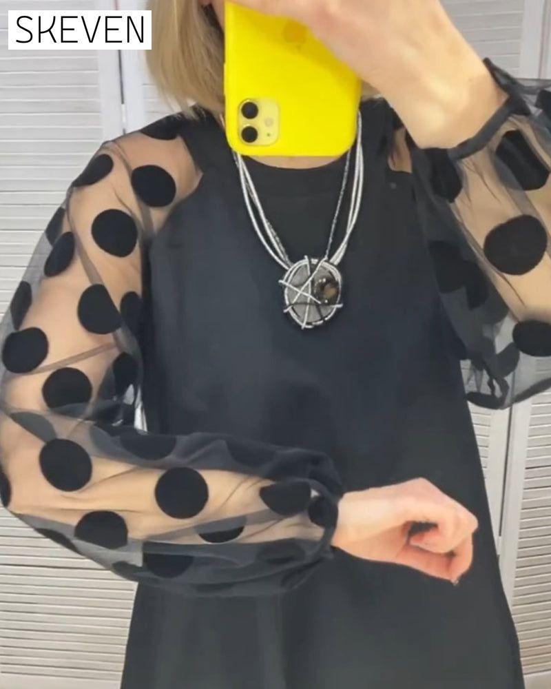 Elegantes Kleid mit Polka-Dot-Muster