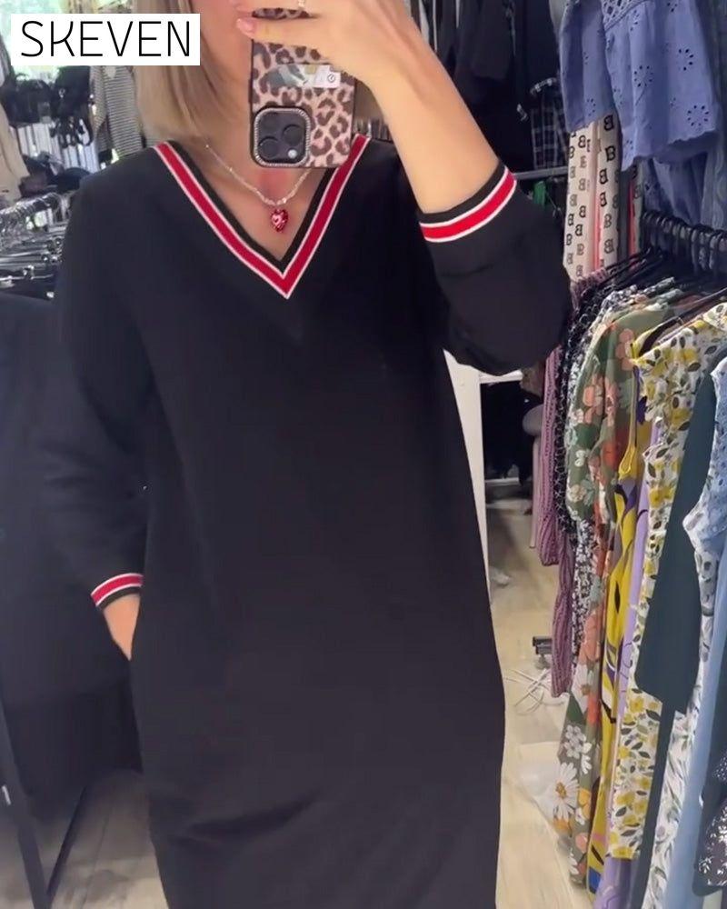 Robe élégante à col en V avec poches