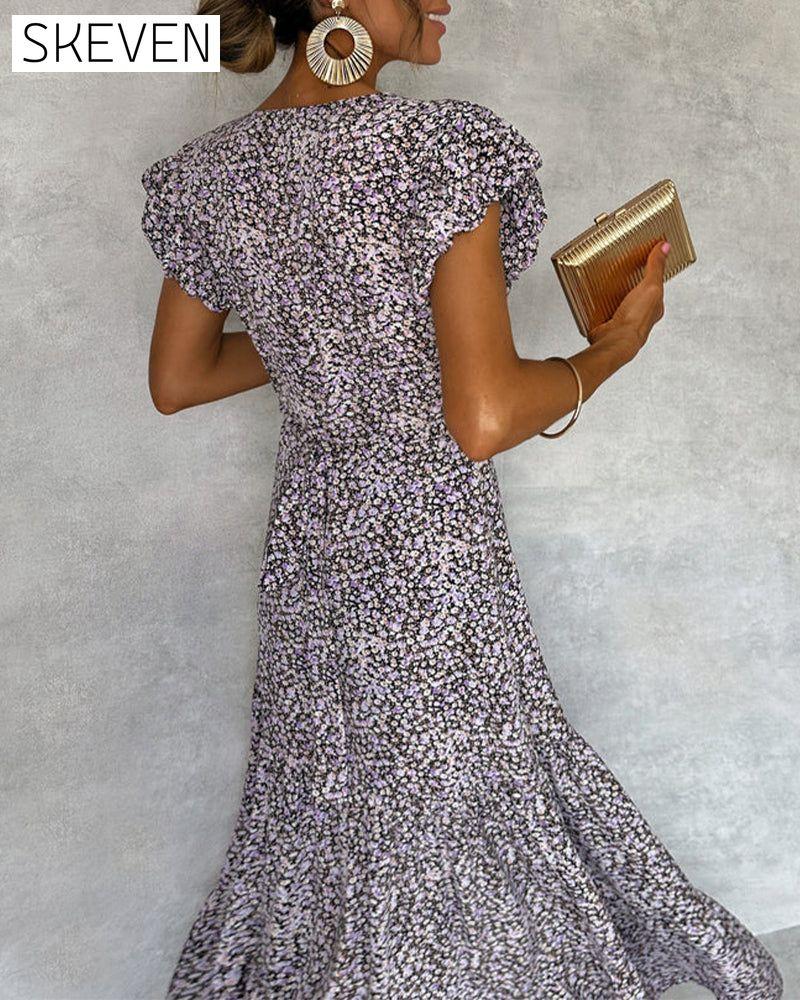 Robe élégante à manches à volants et fente