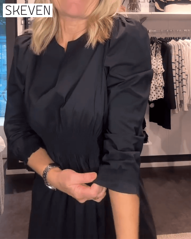 Robe trapèze à manches bouffantes et taille haute