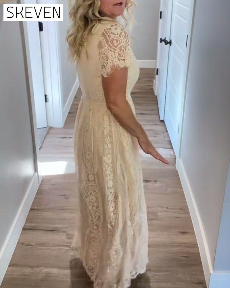 Elegantes Kleid mit V-Ausschnitt und Spitze an der Taille