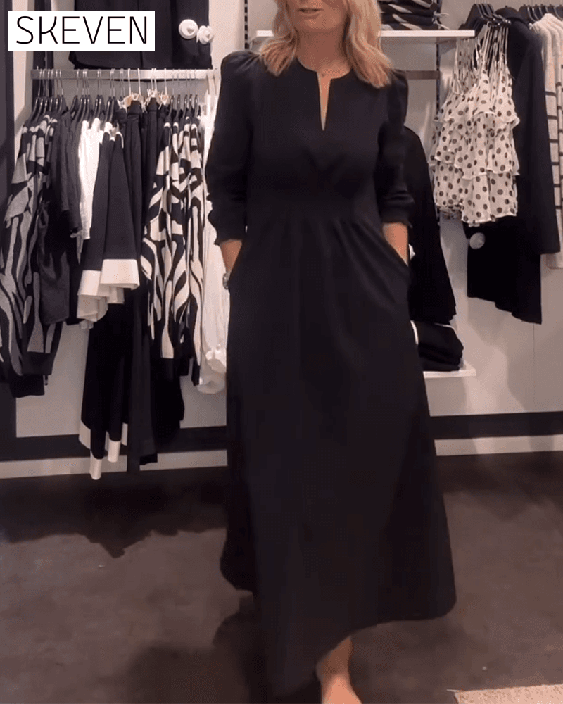 Robe trapèze à manches bouffantes et taille haute