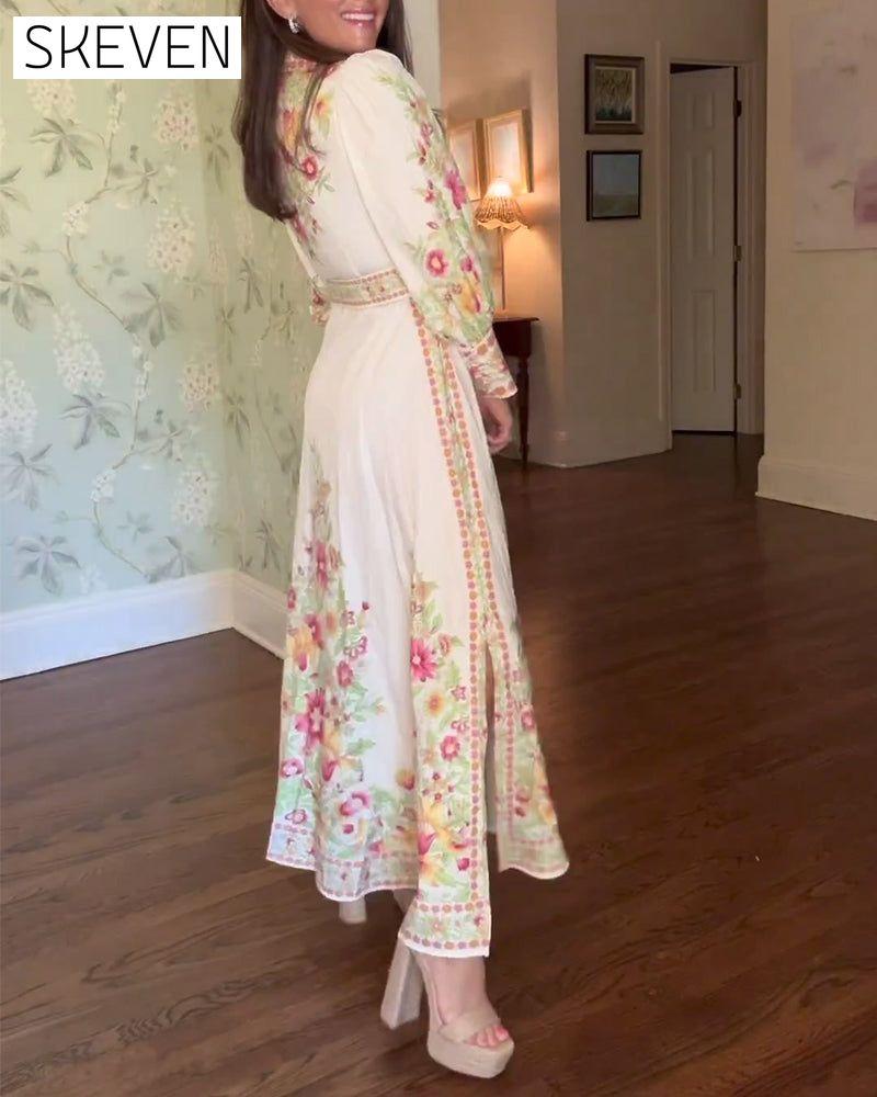 Elegantes Maxikleid mit floralem Muster, Reverskragen und langen Ärmeln