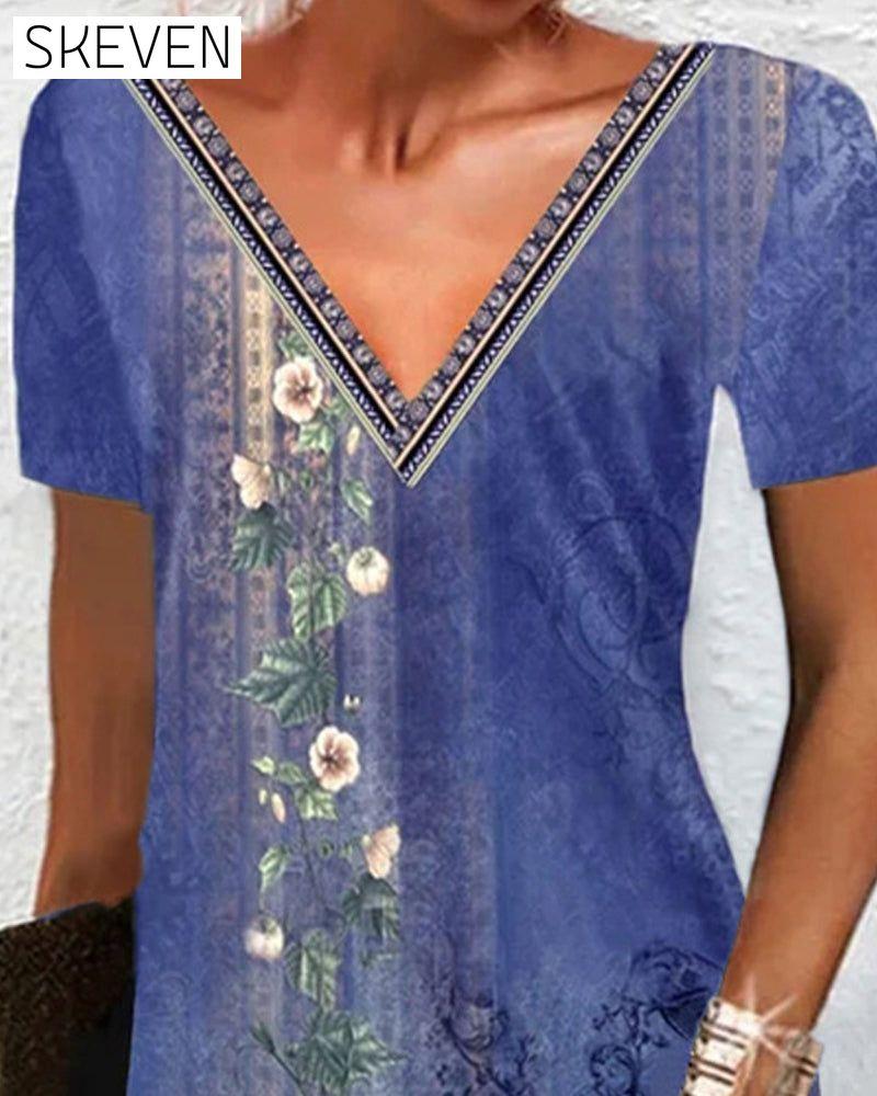 Kleid mit Blumenmuster und kurzen Ärmeln