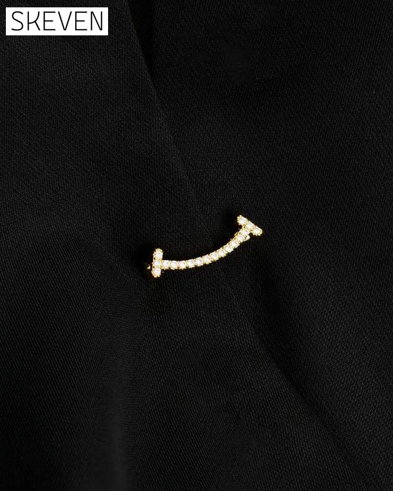 Broche mignonne avec un visage souriant