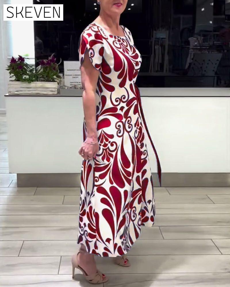 Elegantes Kurzarmkleid mit Kontrastprint