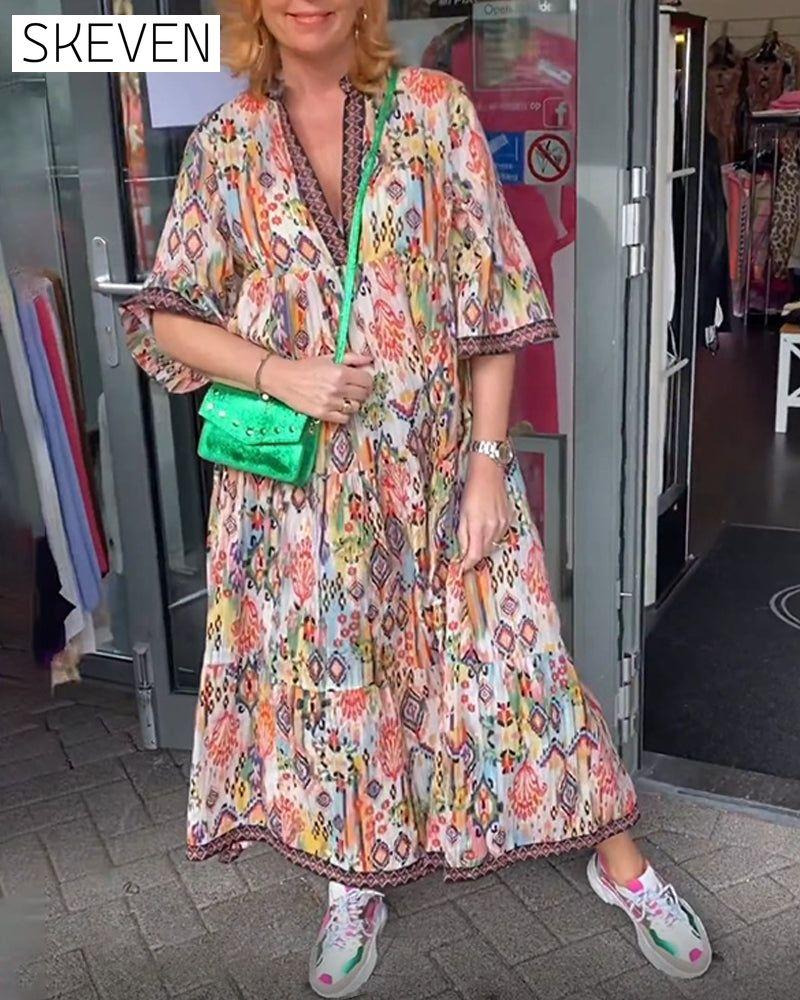 Elegantes, bedrucktes langes Kleid mit V-Ausschnitt