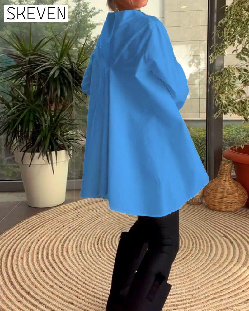 Solid color commuting top