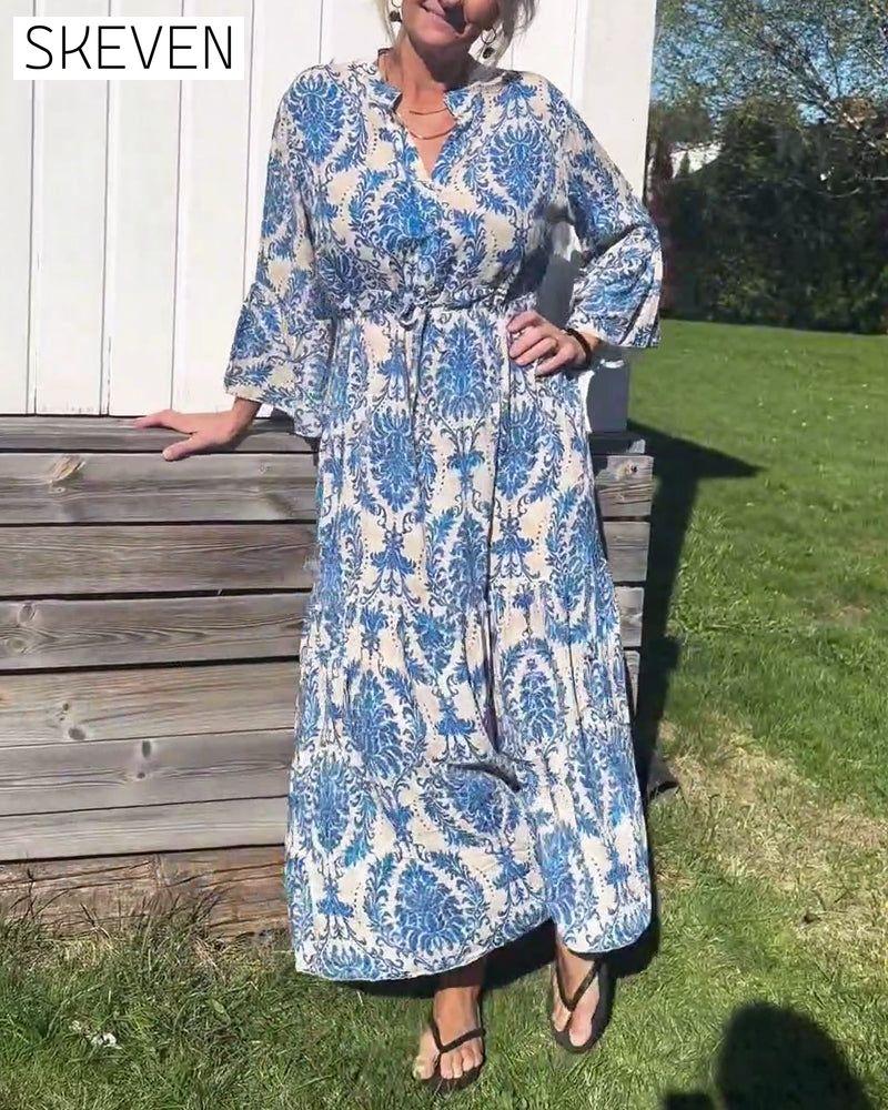 Bedrucktes Kleid mit Glockenärmeln und Kordelzug