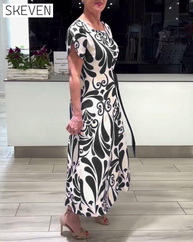 Elegantes Kurzarmkleid mit Kontrastprint