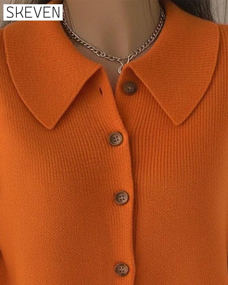 Langärmeliger Pullover mit Knopfleiste und Revers