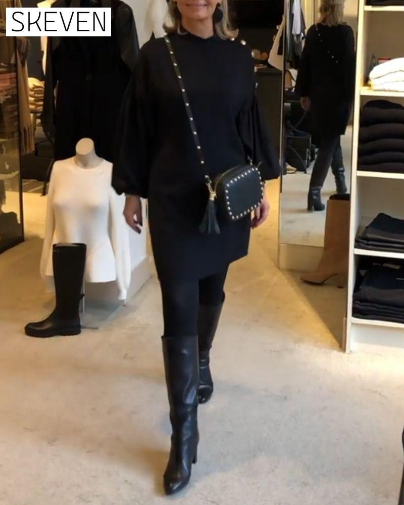 Classic black dress with lantern sleeves