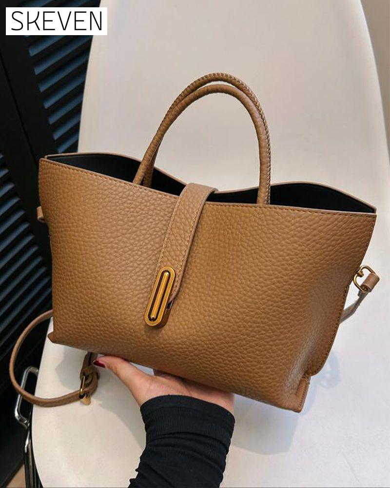 Elegante, einfarbige Damenhandtasche im französischen Stil