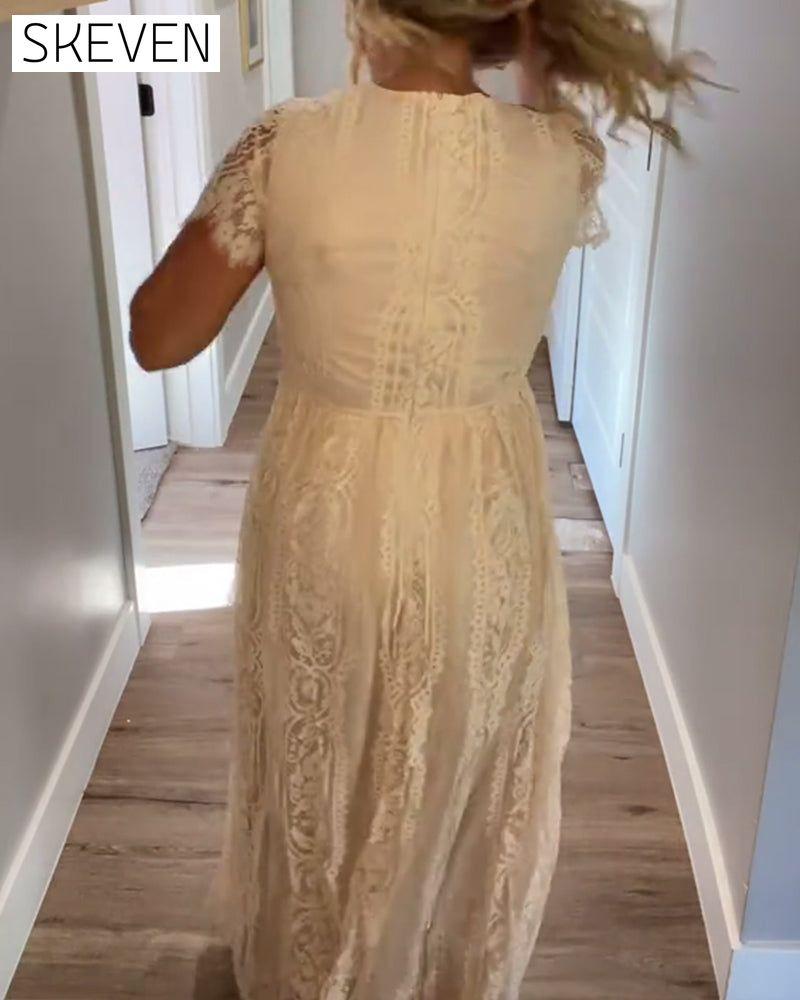 Elegantes Kleid mit V-Ausschnitt und Spitze an der Taille